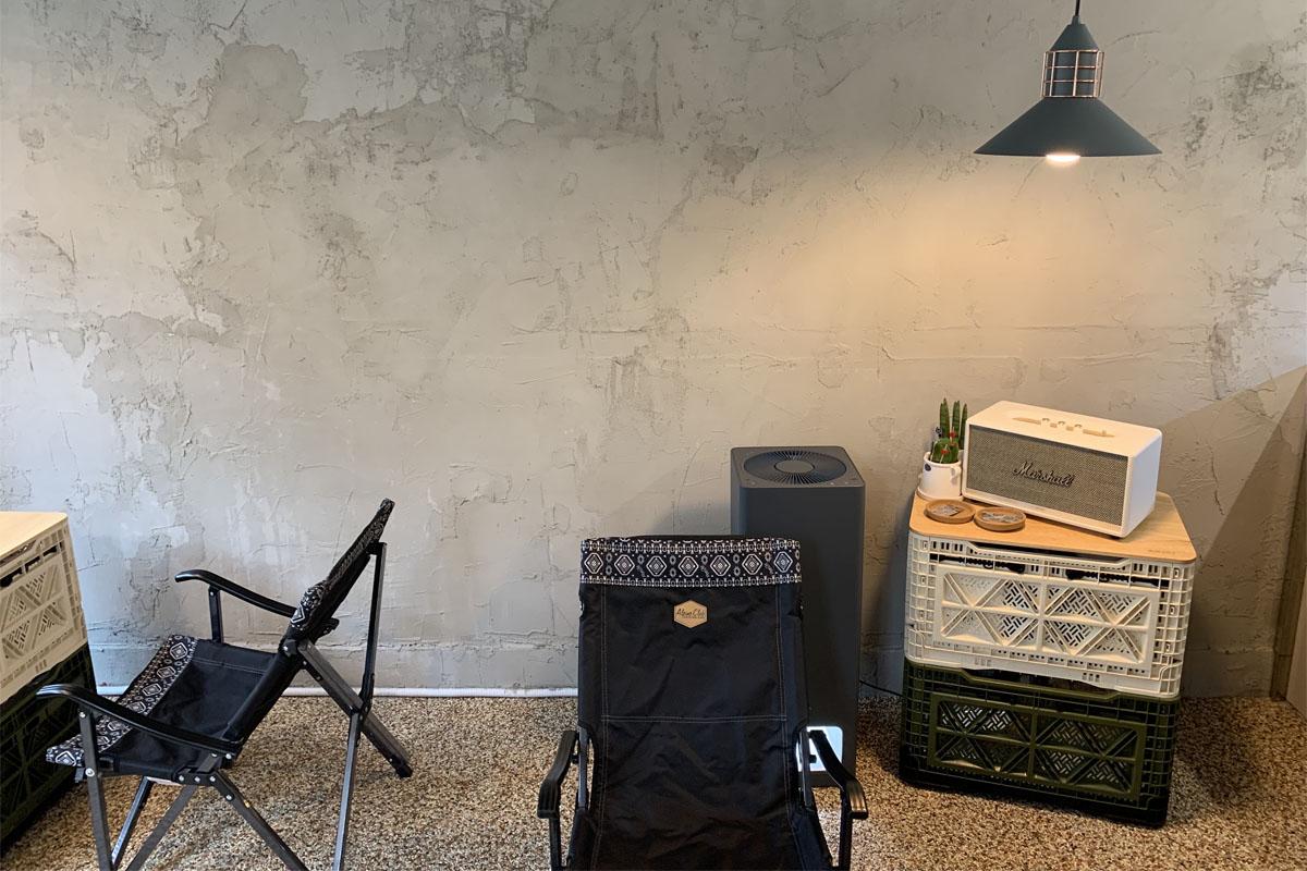 A small speaker that is in front of the counter.