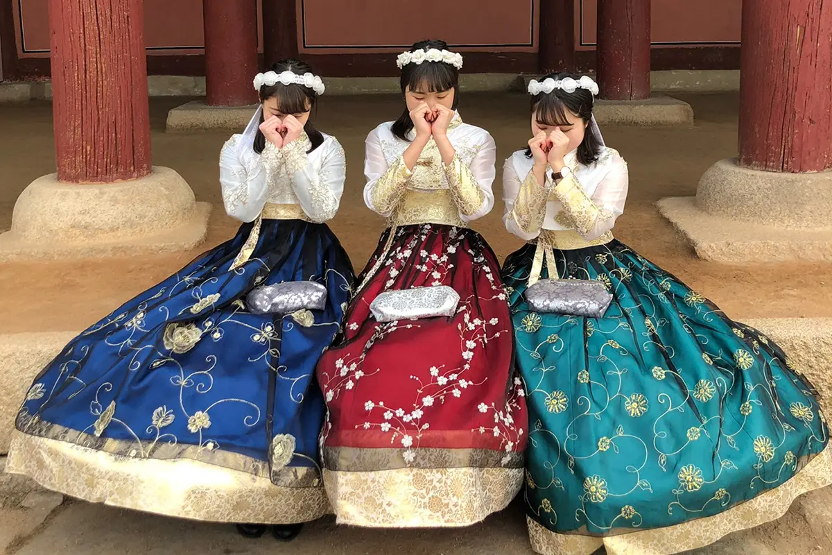 Special hanbok with floral designs displayed at Dorothy Hanbok rental shop in Seoul.