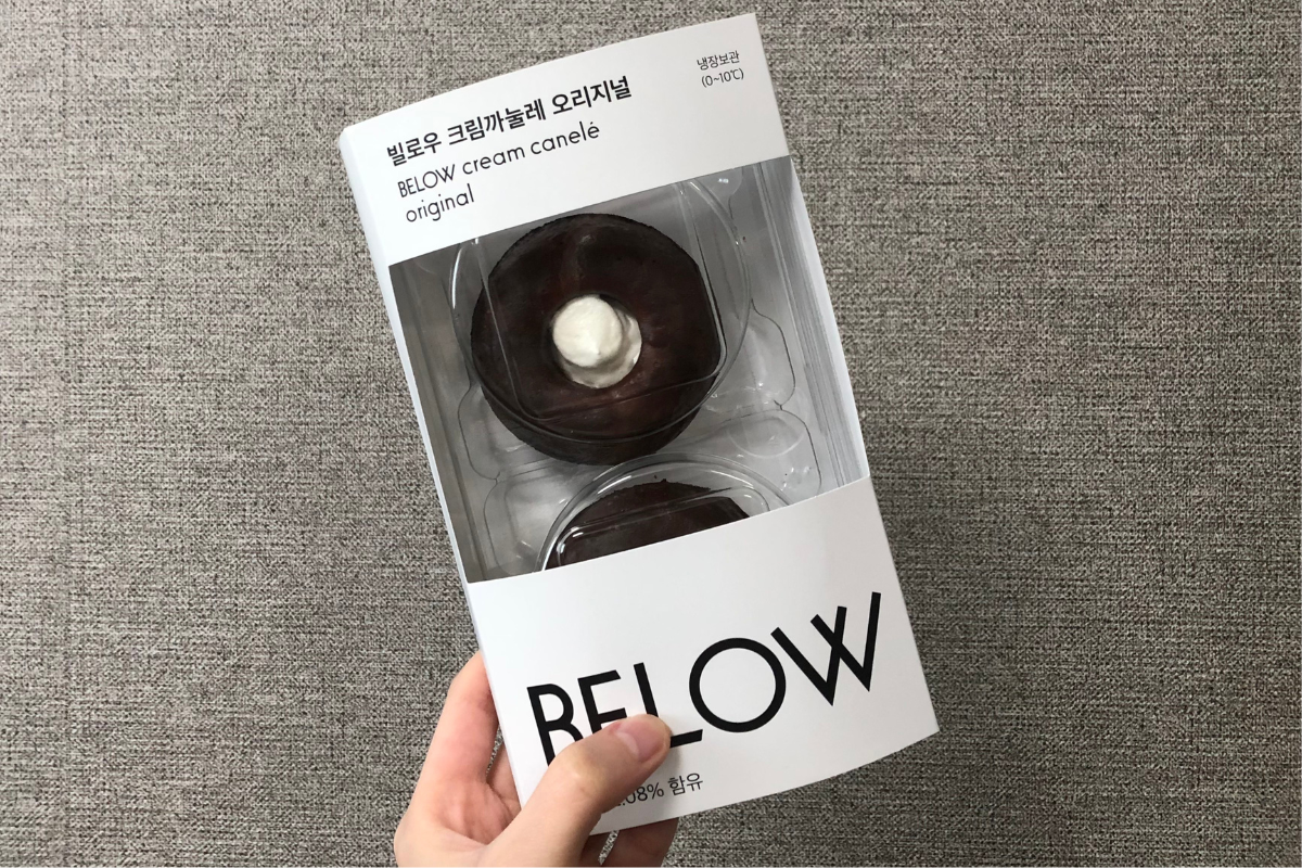 BELOW品牌的忌廉可麗露甜品，外包裝簡約大方，迎合現代人對精緻甜點的需求。