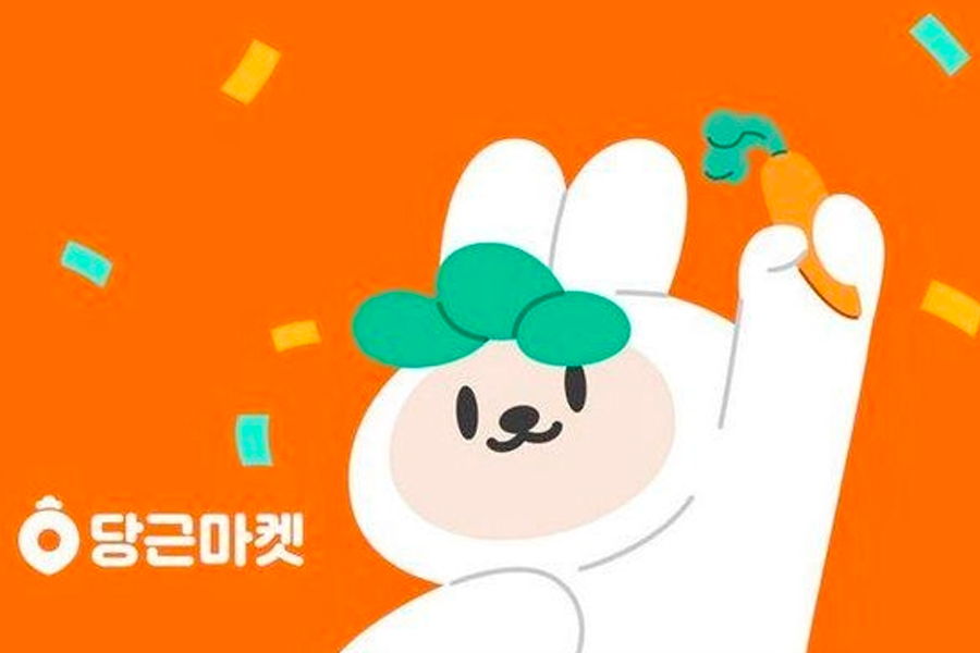 紅蘿蔔市場經典兔子形象，白色兔子舉著一根紅蘿蔔，背景為橙色，代表熱門二手交易App的Logo。