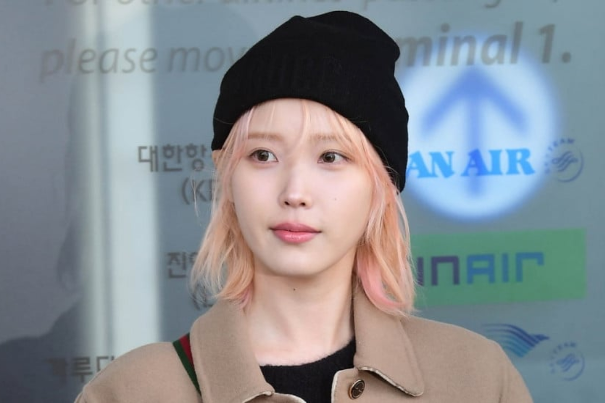 IU with a vibrant pink hair color, perfect for making a bold statement this spring.