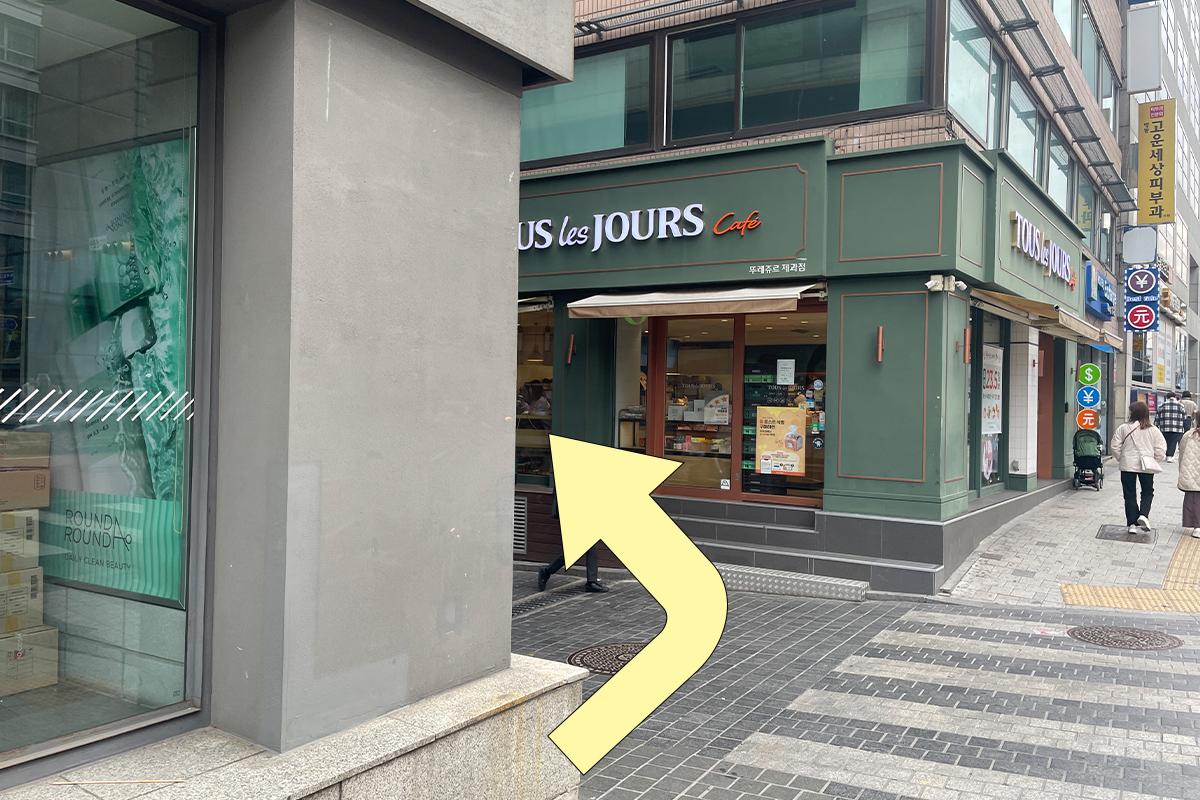 Building with Happy Skin Spa signage, located on the 7th floor in Myeongdong.