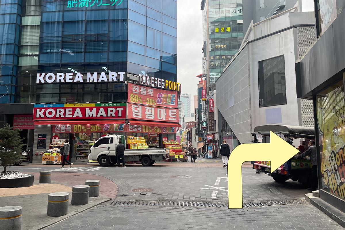Interior view of first floor of Gana Building, with an elevator leading to Happy Skin Spa.
