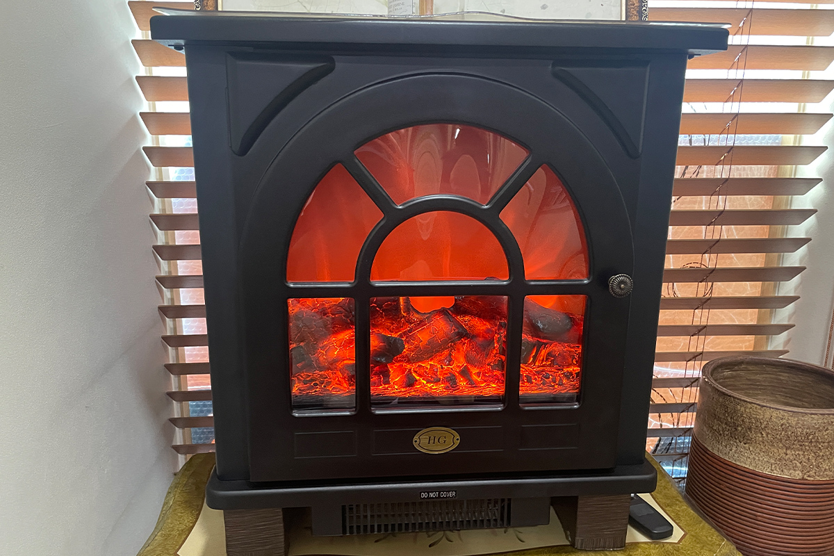 Modern electric fireplace enhancing the warm ambiance at Happy Skin Myeongdong Spa.