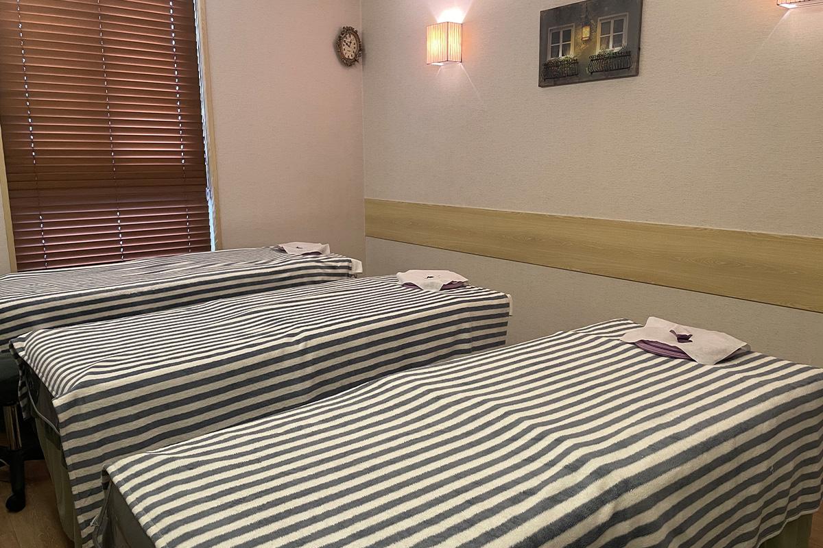 Product showcase featuring an array of skincare and spa products at Happy Skin Myeongdong Spa.