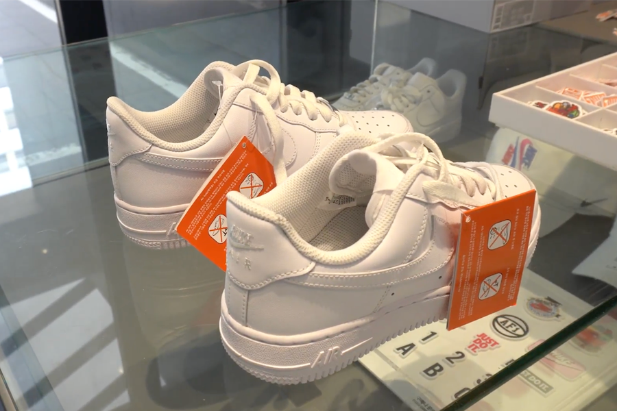 Display of blank Nike Air Force sneakers ready for customization at Apgujeong