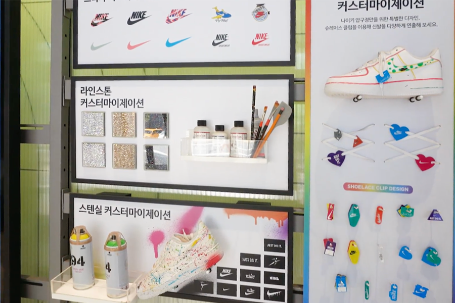 Display of Nike customization options, including rhinestones, paints, and design tools