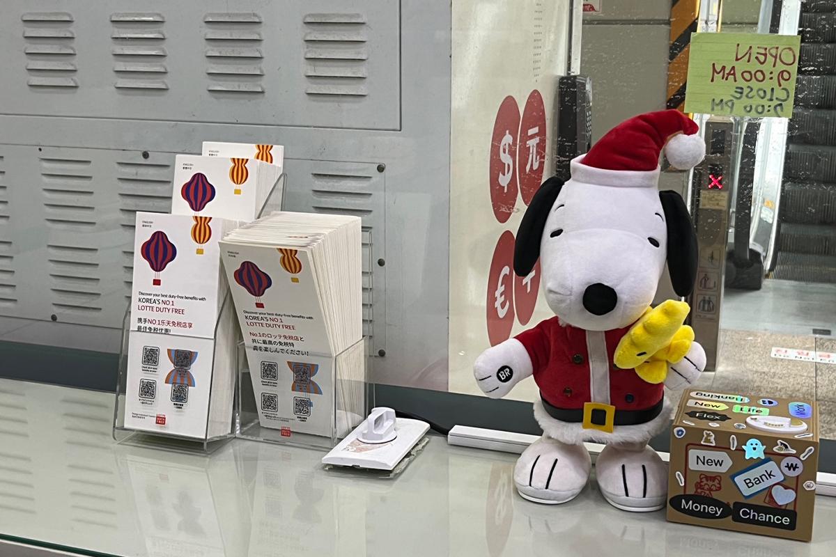 Display of Money Box pamphlets on the counter at the branch, offering currency exchange information and contact details.