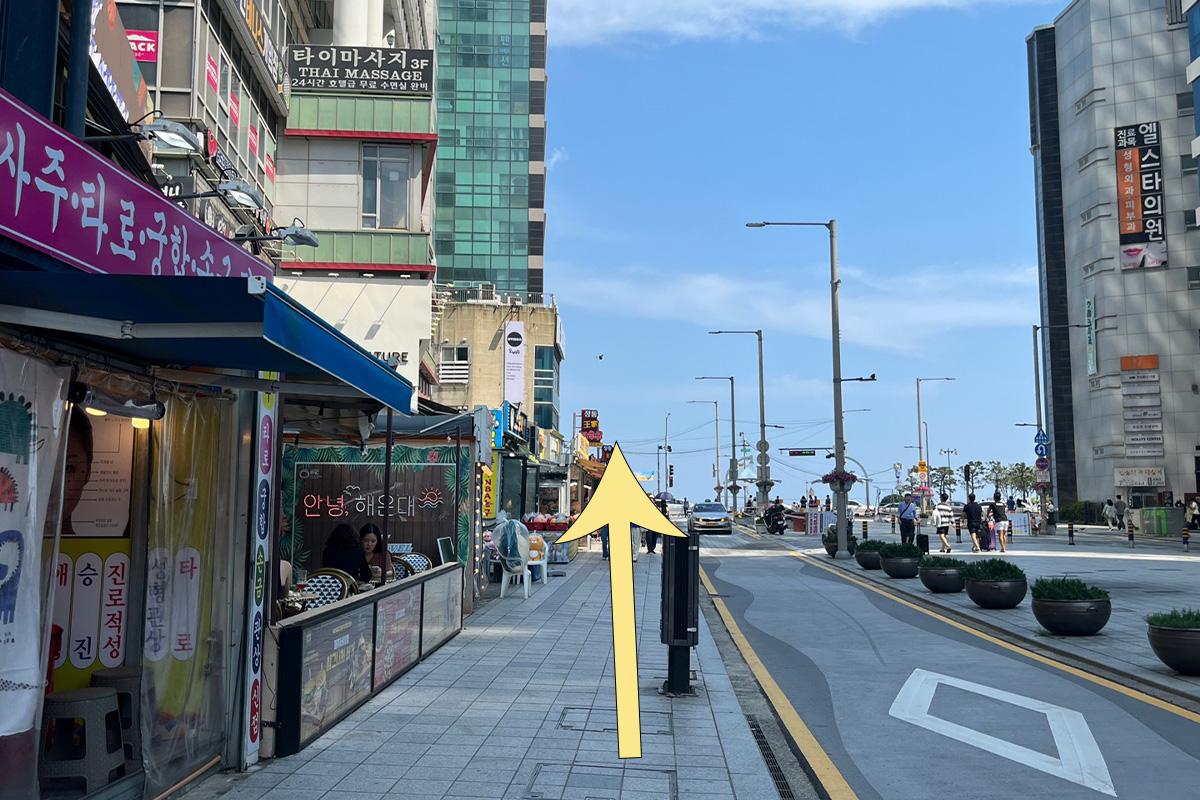 View of Haeundae streets leading to Money Box branch, illustrating nearby shops and eateries.