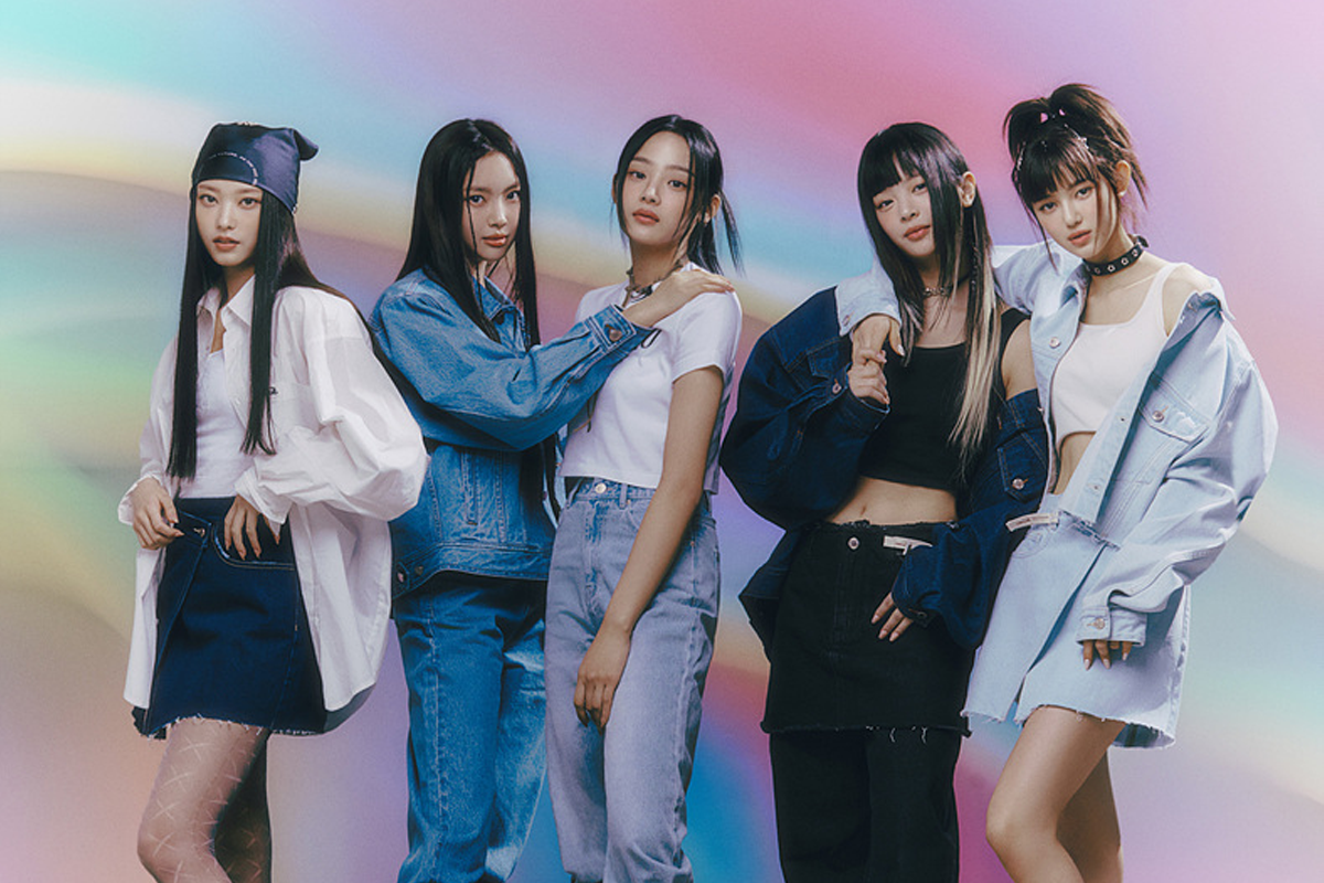 (G)I-DLE成員們穿著粉色調的流行服飾，面對鏡頭擺出動感姿勢。