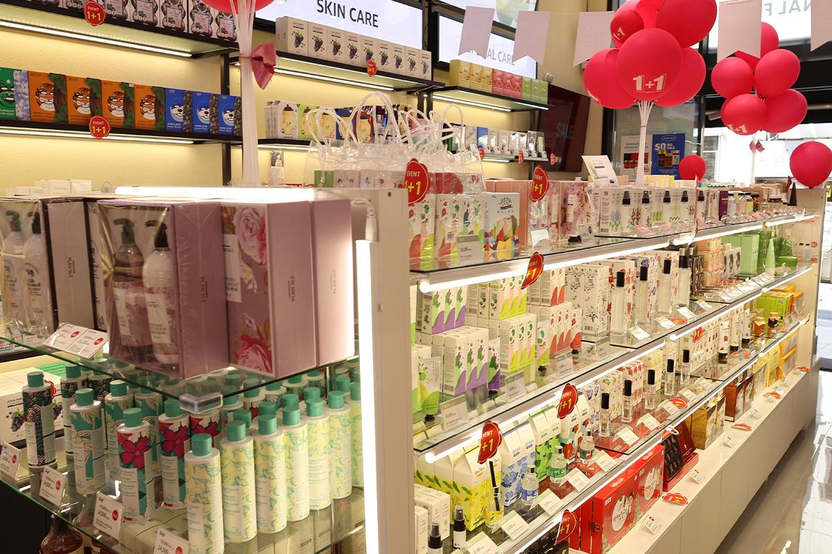Interior view of SD Store showcasing a wide range of cosmetics and skincare products, neatly arranged on shelves.
