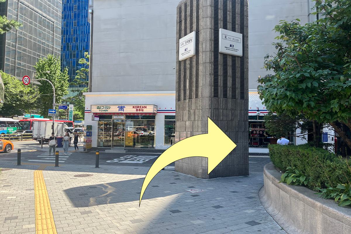 Direction indicating a right turn after exiting the subway station, leading towards SD Store in Myeongdong.