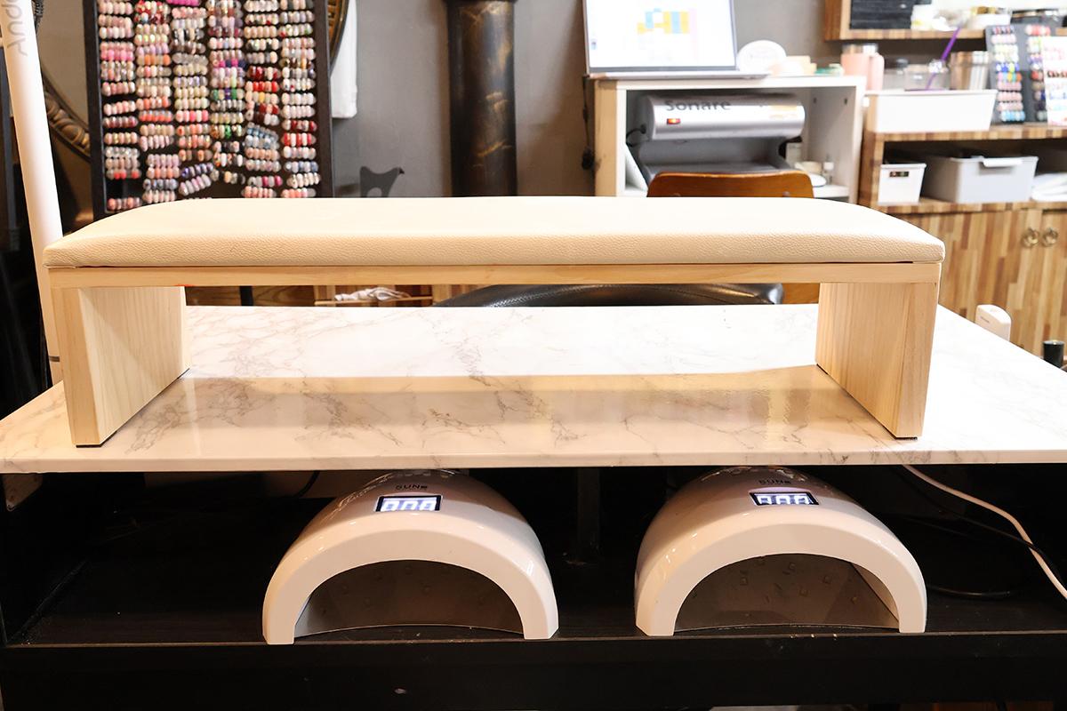 Client enjoying a pedicure service inside Pro Beauty salon.