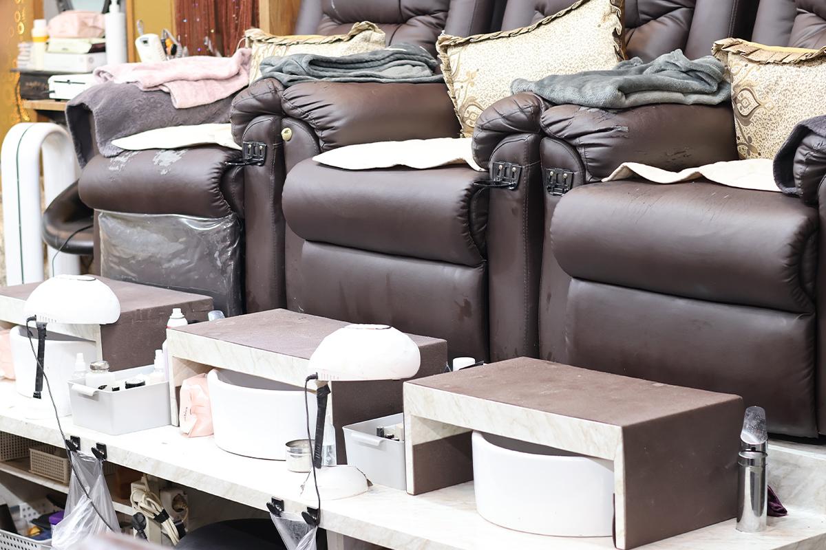 Album with QR codes for booking appointments at Pro Beauty nail salon.