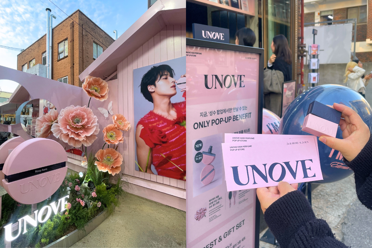 Colorful pop-up shop setup with flowers and the logo