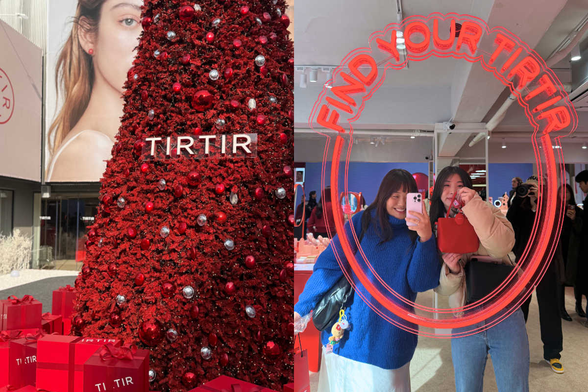 People interacting with a digital display at a trendy pop-up store.