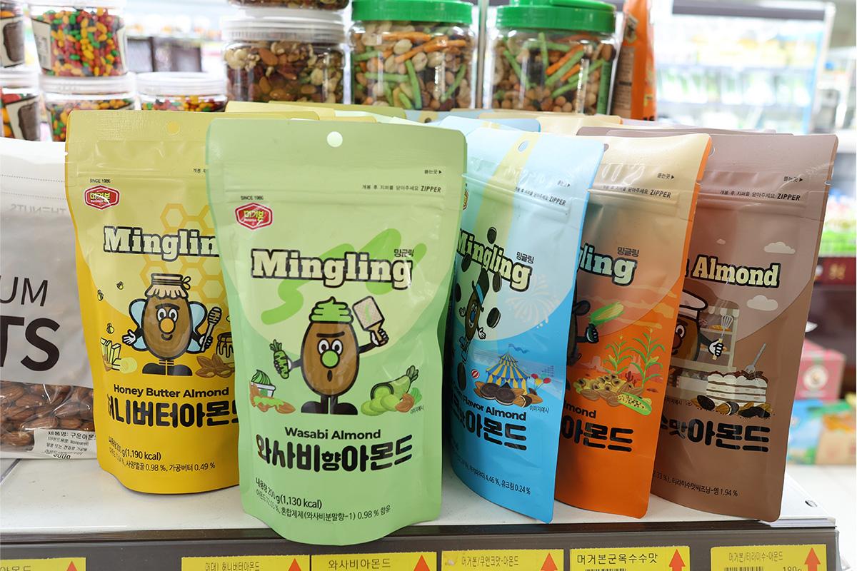A range of flavored almond snacks such as wasabi and honey butter at Hongdae Mart 24 Hours.