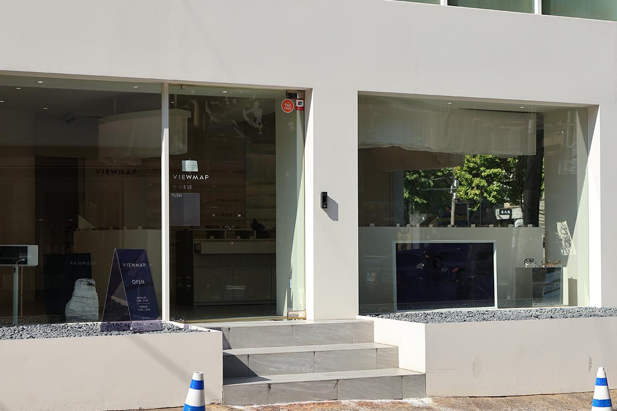 Interior view of VIEWMAP showcasing a variety of glasses on display shelves.