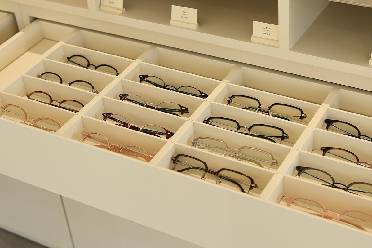 Drawer filled with various eyeglass frames at VIEWMAP store.