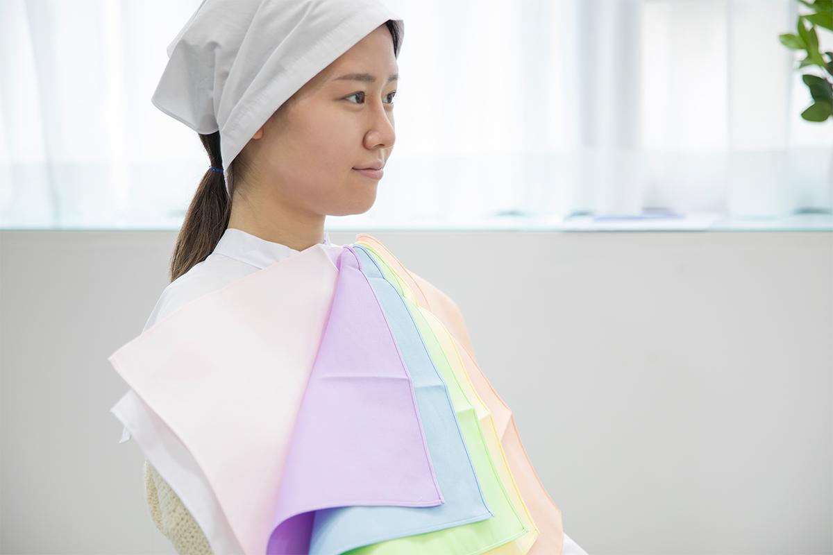 Determining the perfect color palette during a personal color analysis session at The Bom Myeongdong, using chroma and value for precise recommendations.