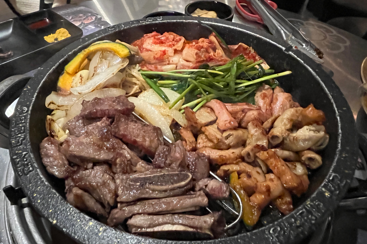 Gunja Daehan Gopchang's sizzling platter of beef intestines, a uniquely Korean dish popularized by celebrities.