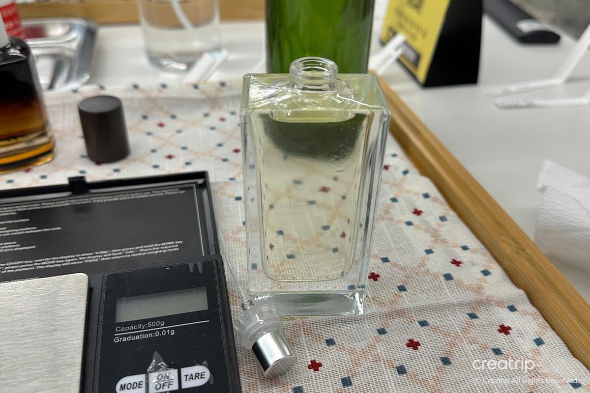 DIY zone at Perfume Play Gangnam featuring stamps and accessories for customizing scent pouch designs.