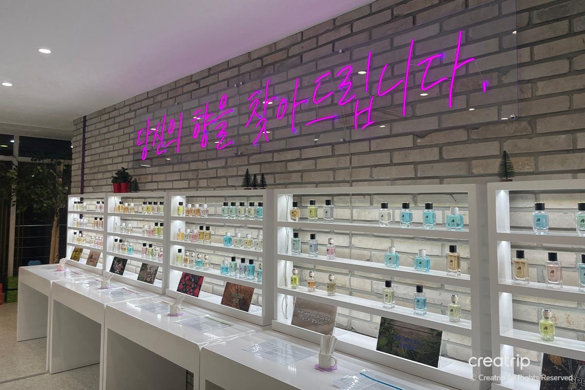 Perfume shelves at Perfume Play Gangnam with a variety of scents available for trying and testing.