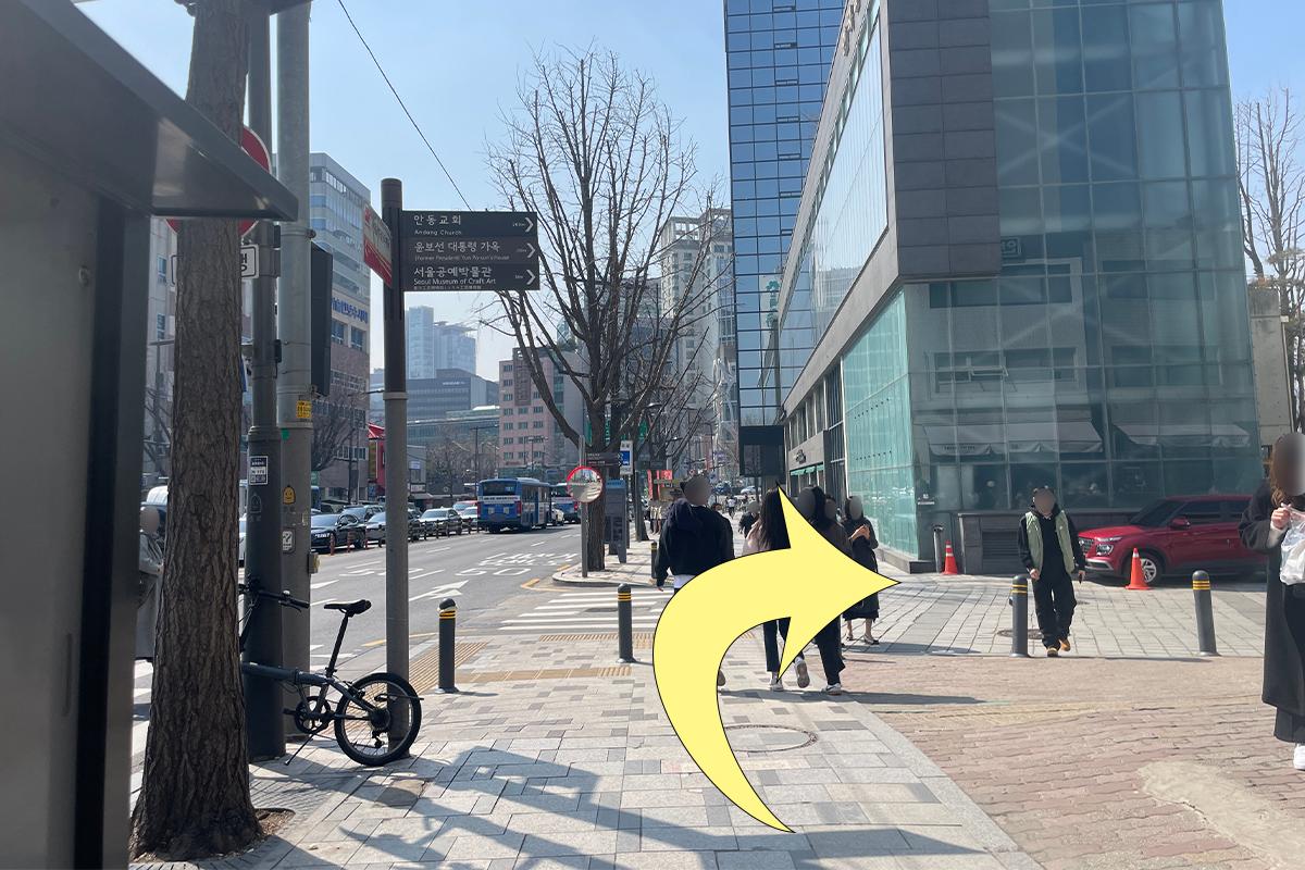 City streets near Anguk Station, showing directions to Bukchon area.
