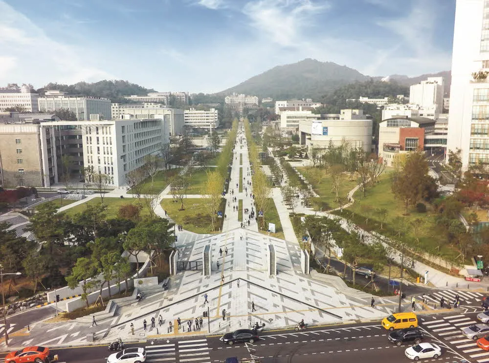 Bird's Eye View of Yonsei University Campus - The panoramic shot captures the expansive and beautifully landscaped campus of Yonsei University in Seoul, South Korea.
