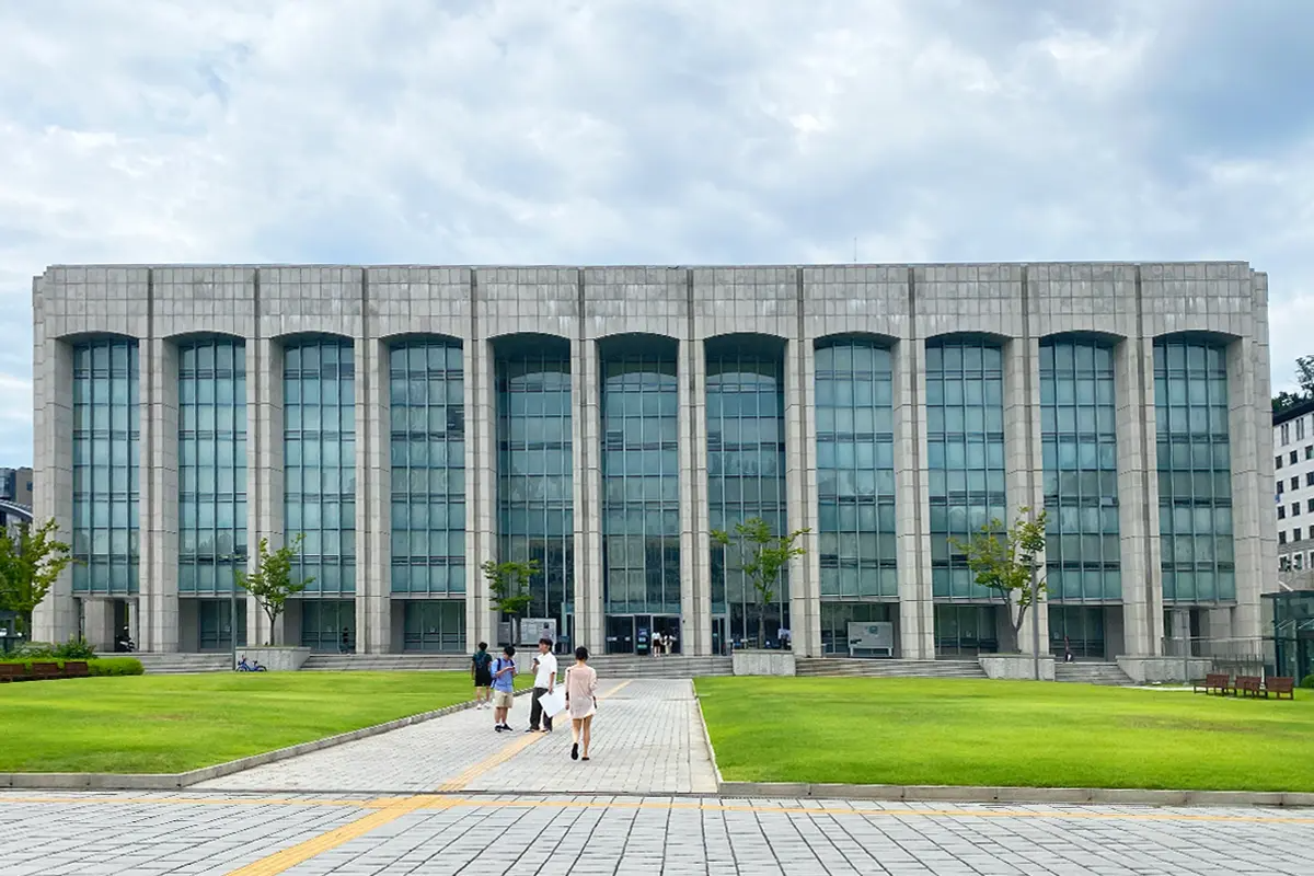 Front view of Yonsei University Central Library, showcasing its monumental architecture.
