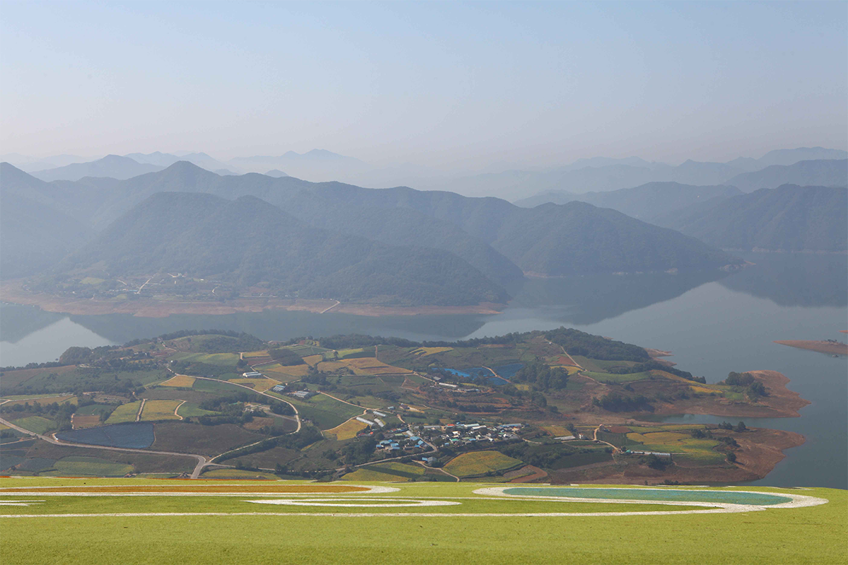 Jecheon scenic view showing mountains, a large lake, and countryside landscapes, highlighting its natural beauty.