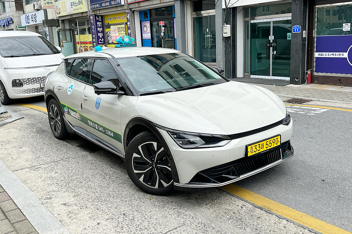 Jecheon taxi tour vehicle parked on a street ready for passengers, part of the private travel service