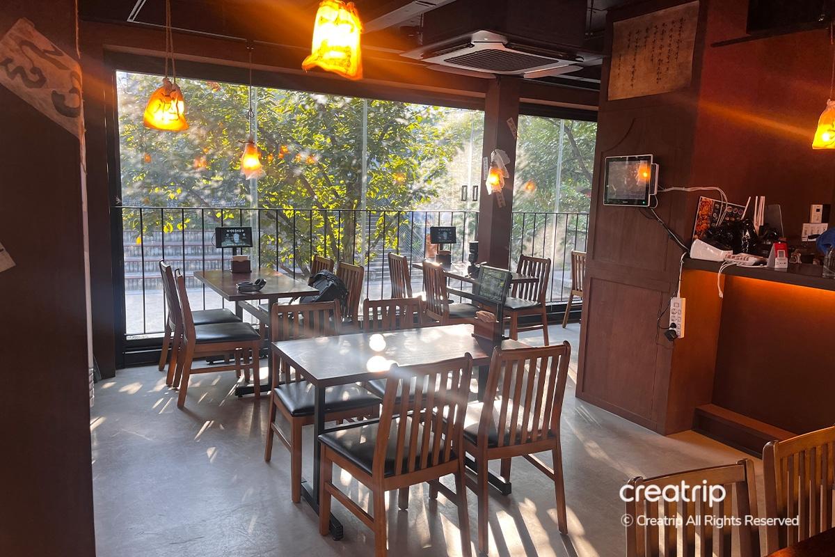 Bar counter at Earl in Hongdae, displaying an array of premium whiskeys.