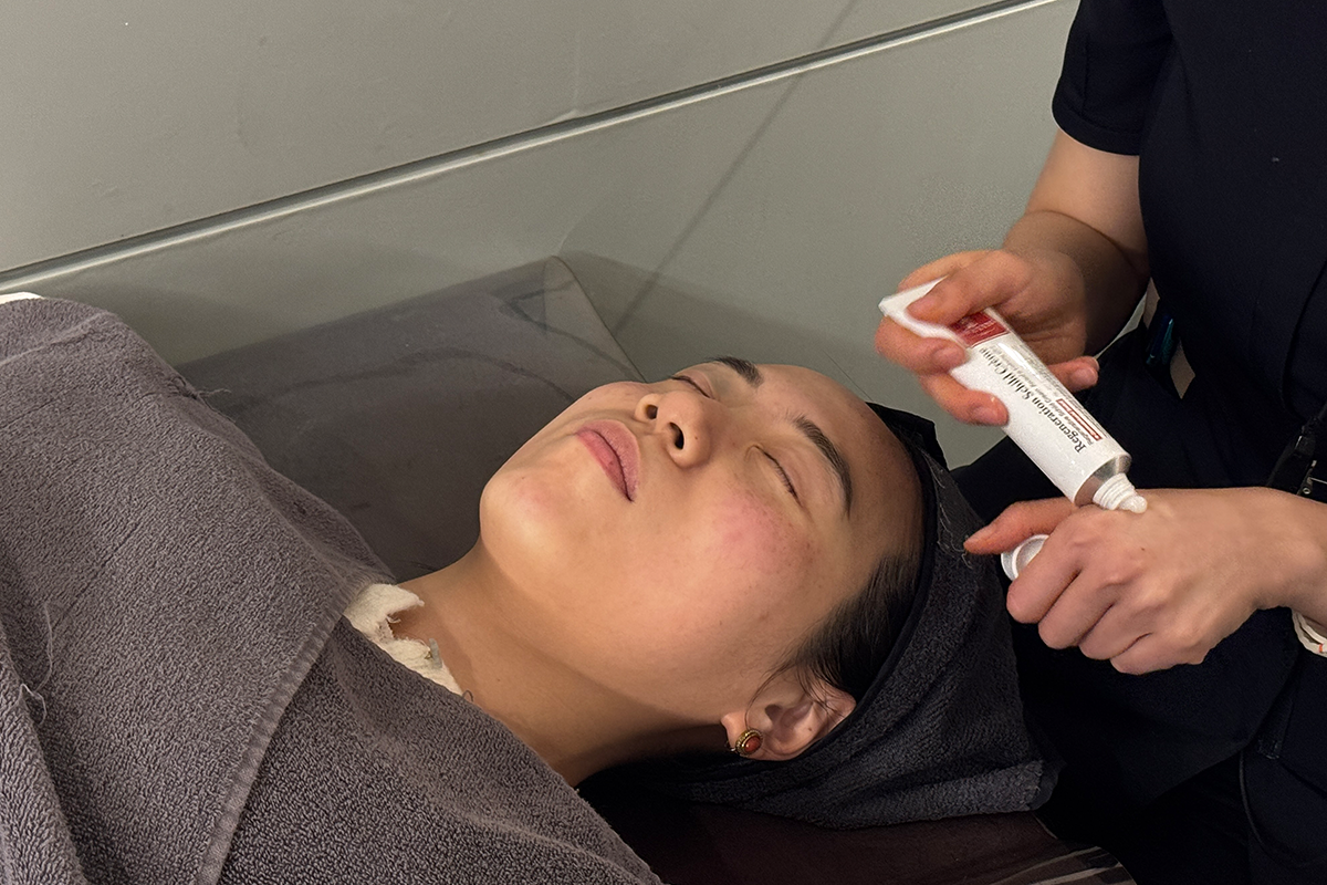 Modeling mask applied as a final step in a skin therapy session.
