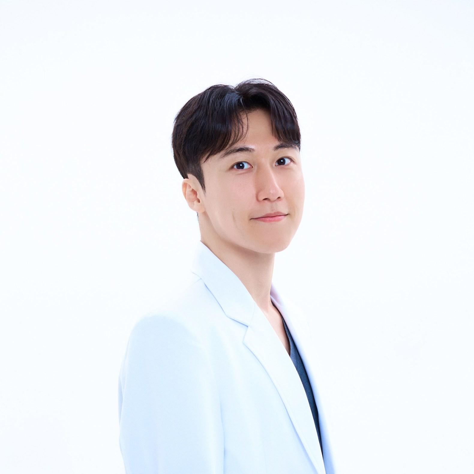 Dr. Lee Kwang-ryeol, Director of DIORE Dermatology Clinic in Seoul Gangnam district, standing in a white doctor