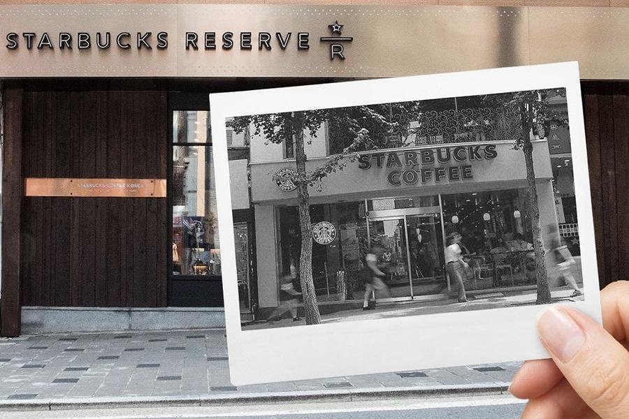old starbucks photo in black and white held up in front of new remodeled starbucks reserve at ewha womans university