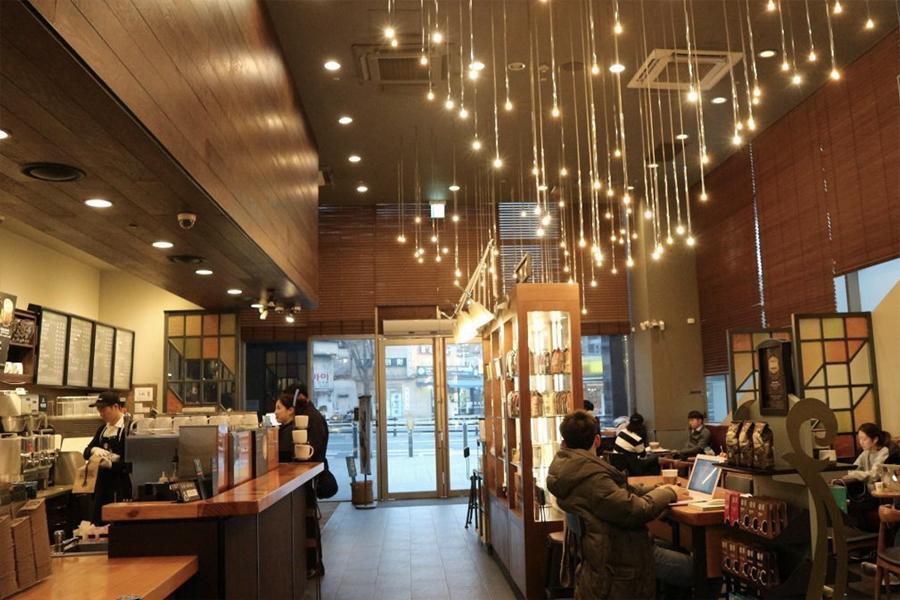 inside view of starbucks chungjeong-ro with hanging lights 