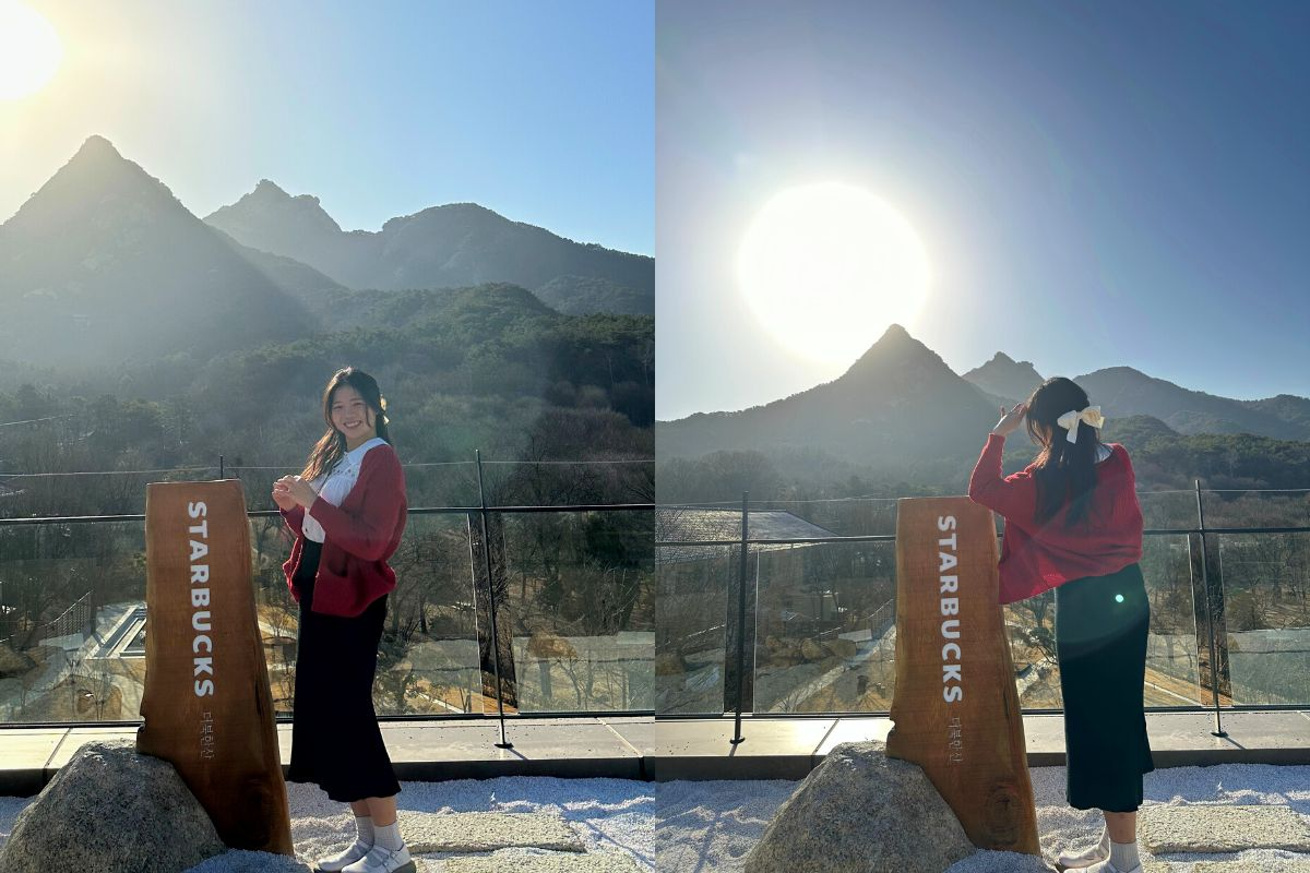 スターバックス北漢山店の屋上テラス、バックには美しい山々が広がる