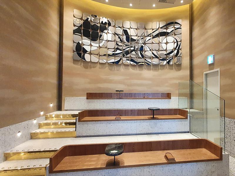 starbucks artwork and stair like seating arrangement at byeoldabang in korea