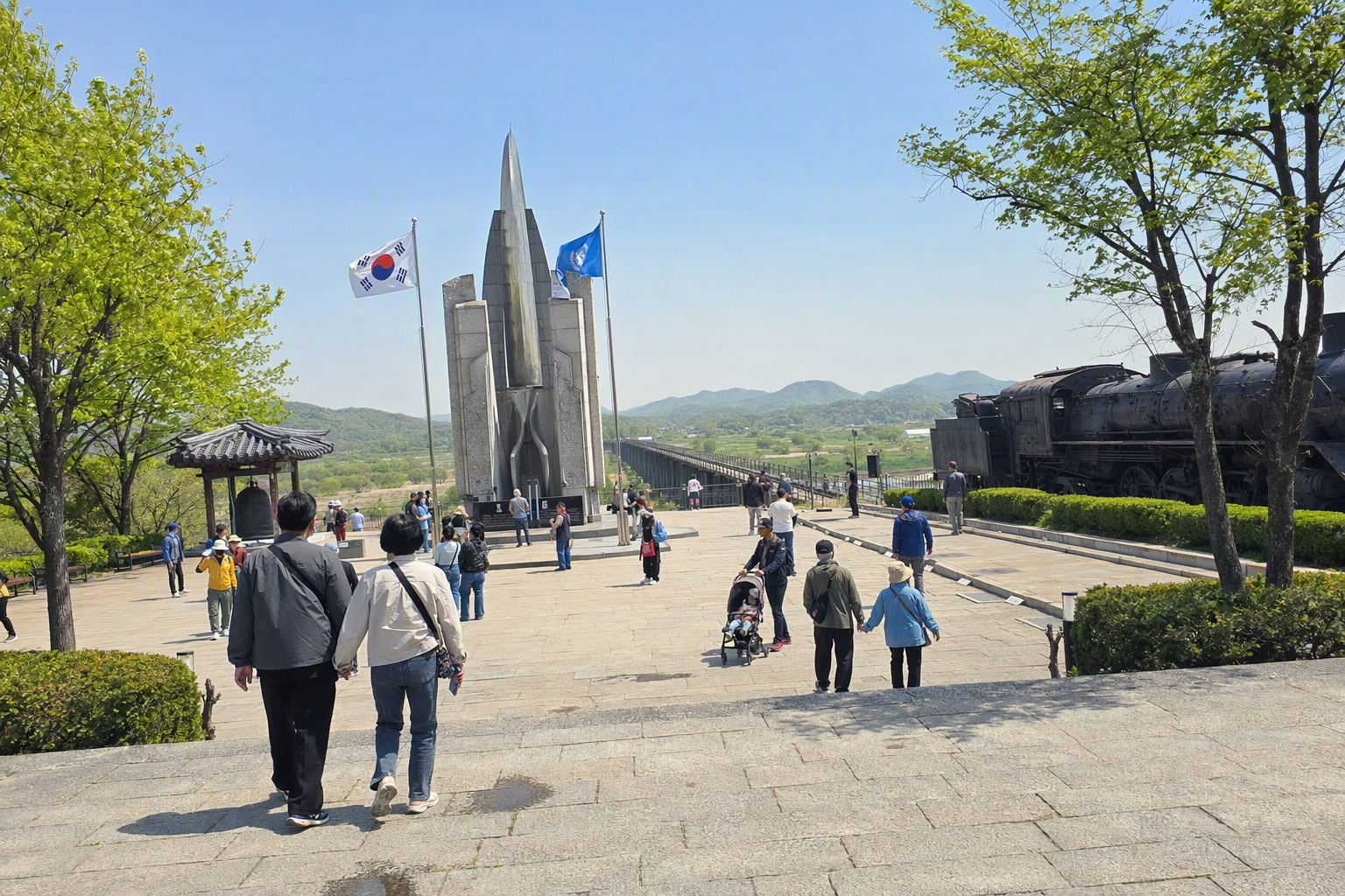Bright photorealistic view of Imjingak Peace Park, open plaza, memorial sculptures, travelers walking, blue sky, crisp spring light, vibrant colors, no Korean t