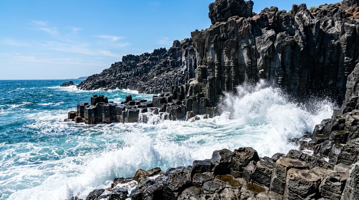 Bright photorealistic close view of Daepo Jusangjeolli basalt columns with powerful ocean waves splashing under a clear sky, no text