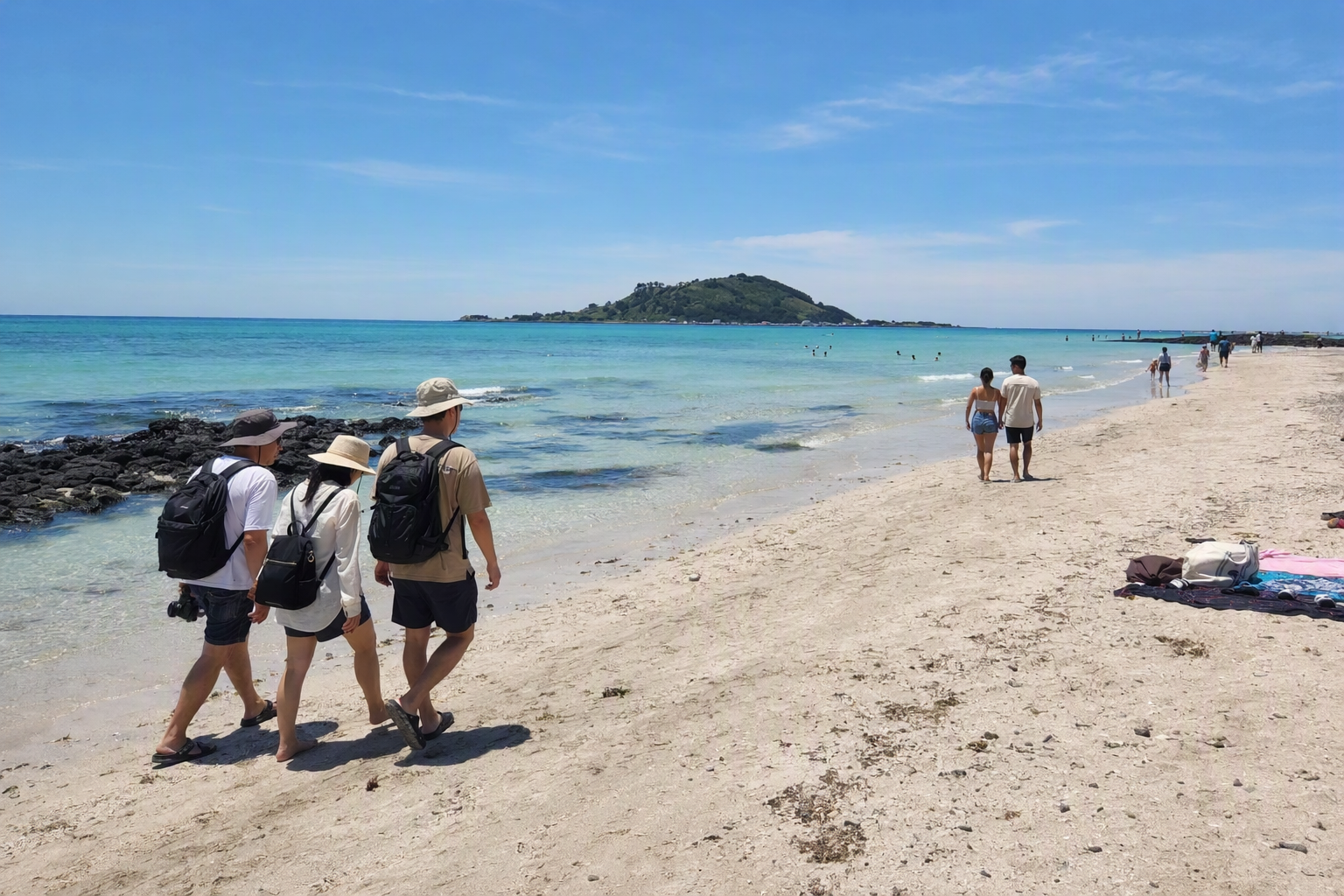 Bright photorealistic scene of Hyeopjae Beach in Jeju with white sand, turquoise shallow water, Biyangdo Island in the distance, and travelers walking casually,