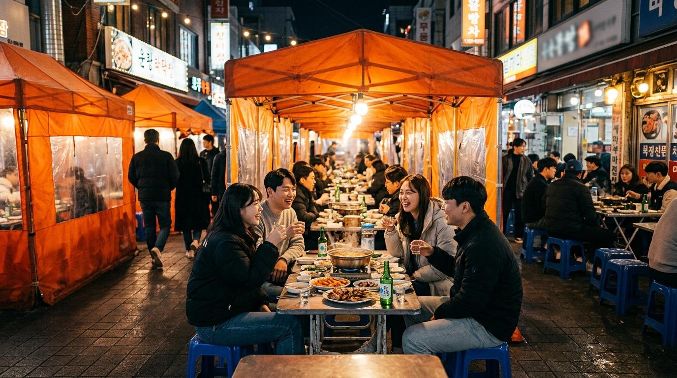Photorealistic Seoul pojangmacha street at night with orange tent bars, plastic stools, steaming dishes, friends drinking soju, warm lively lighting, no text