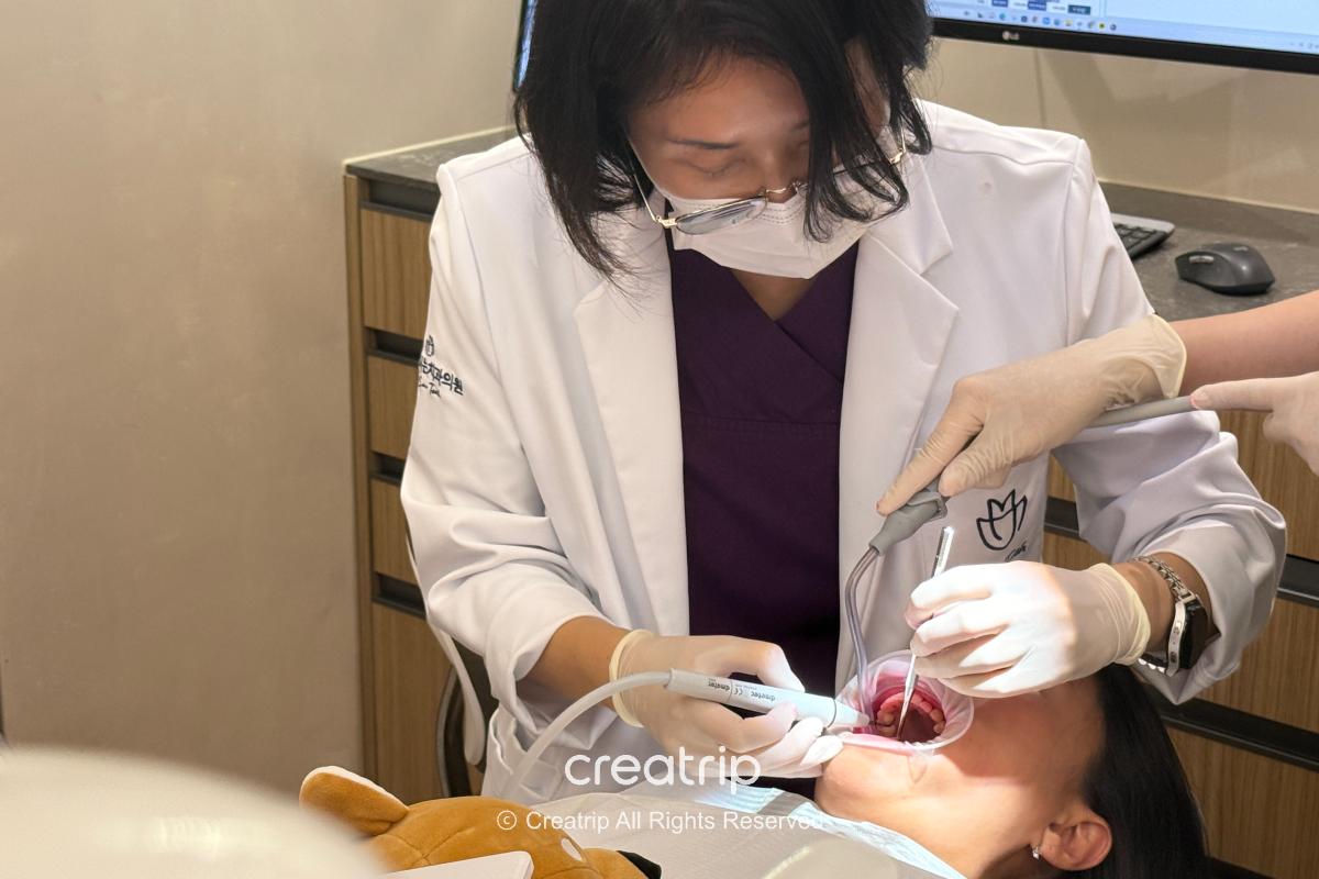 Dentist providing oral care