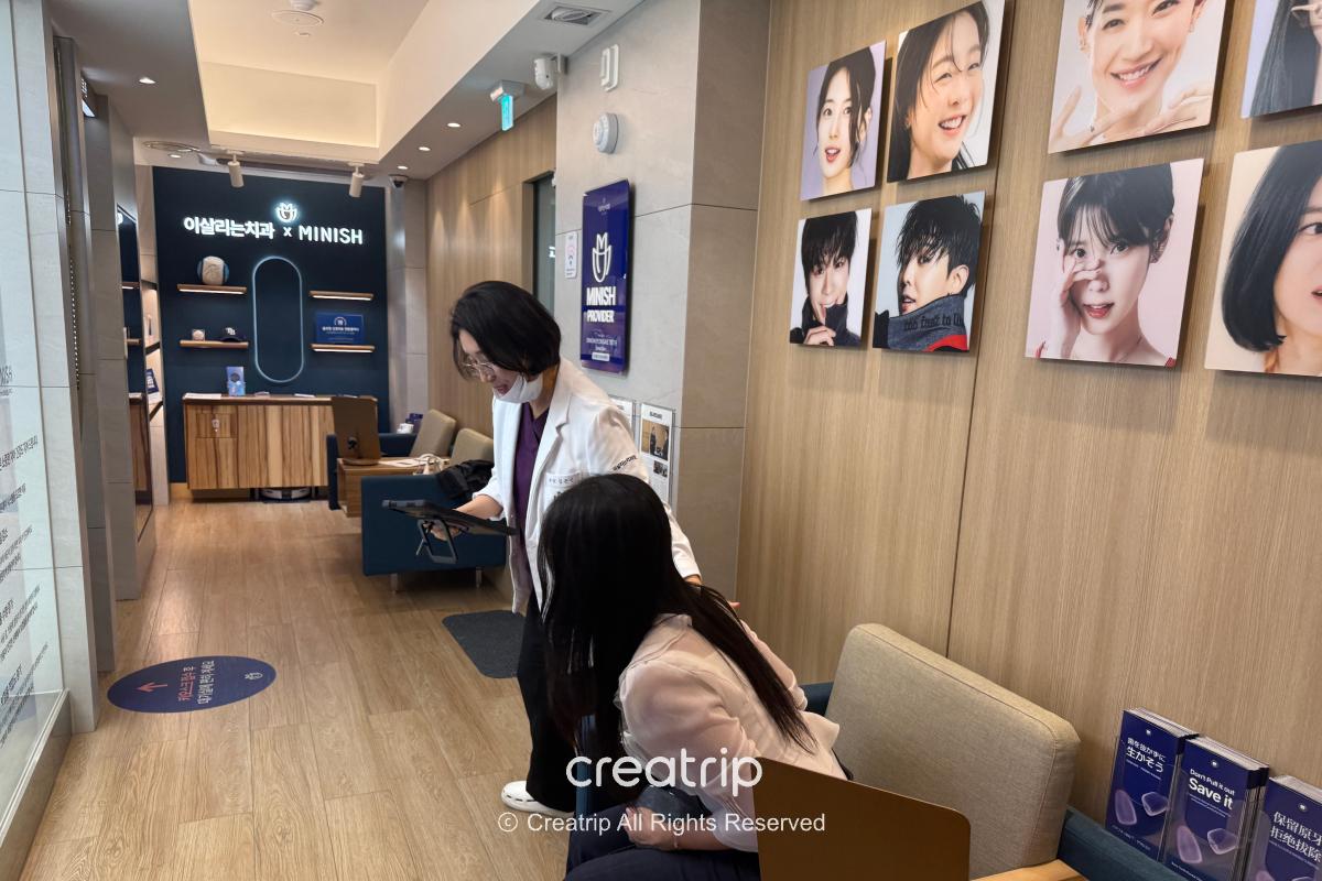 Dentist greeting a visitor in the waiting area