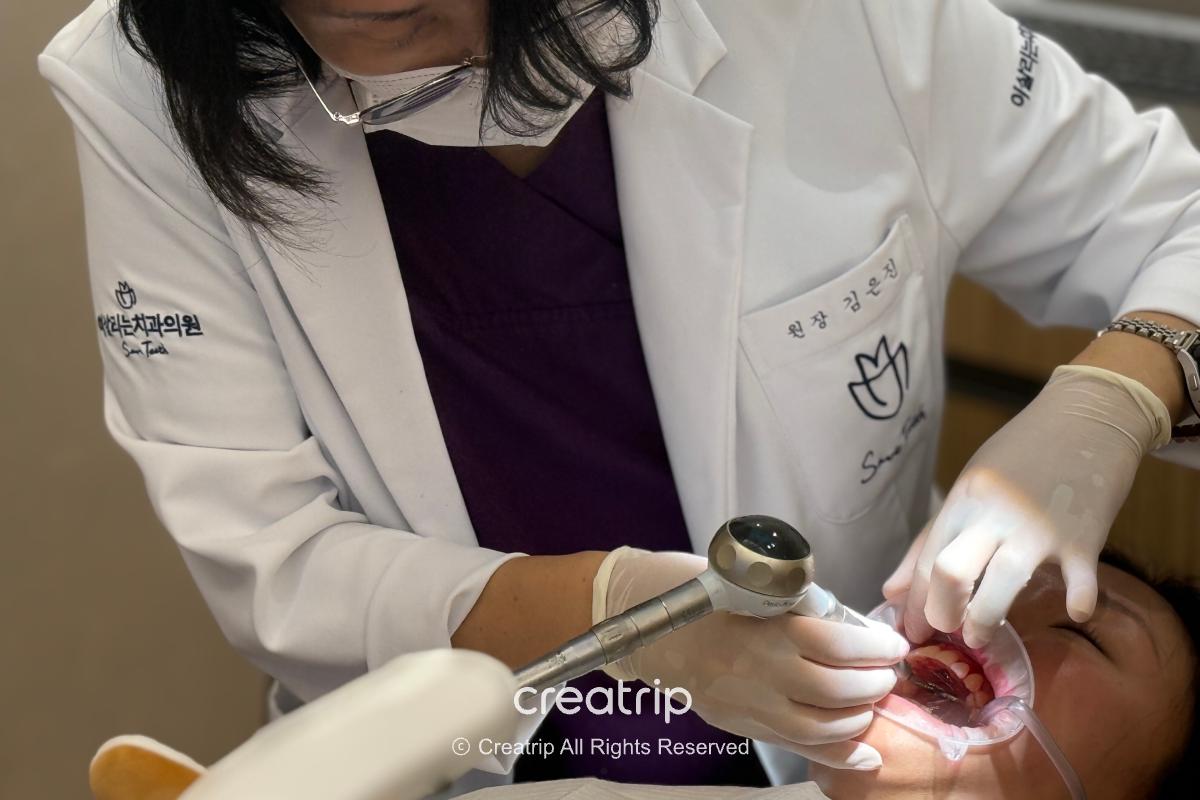 Dental care using a handheld device