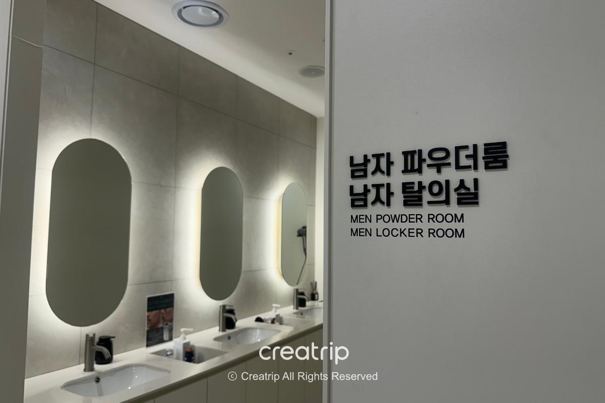 Vanity mirrors and Korean sign for the men