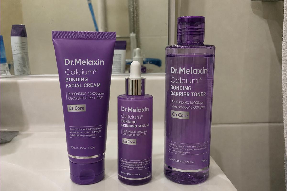 Dr. Melaxin Calcium Bonding barrier toner, serum, and facial cream used in the editor’s skincare routine