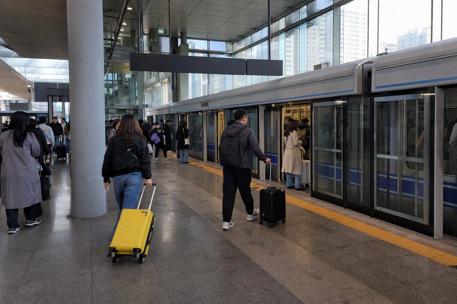 Bright vibrant photorealistic airport rail transfer scene in Seoul with travelers carrying suitcases, sleek train platform, colorful wayfinding without readable