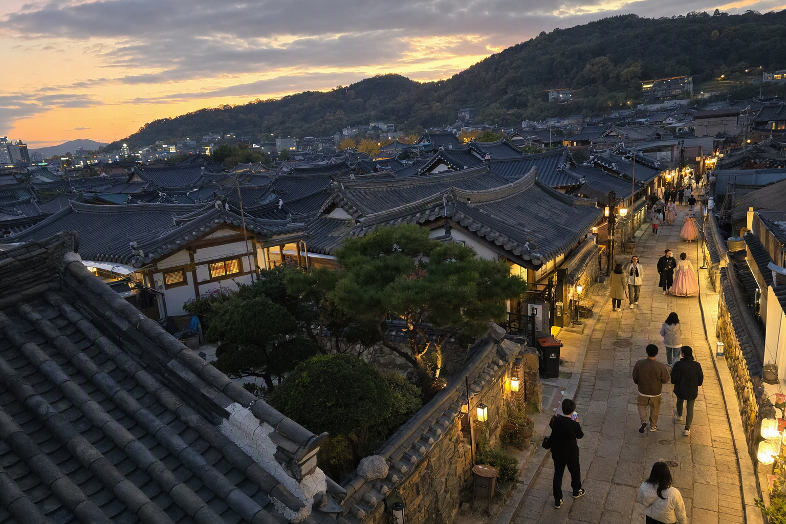 Bright, vibrant, photorealistic view of Jeonju Hanok Village rooftops at golden hour with tiled roofs, warm lights, narrow lanes, and travelers walking, no Kore